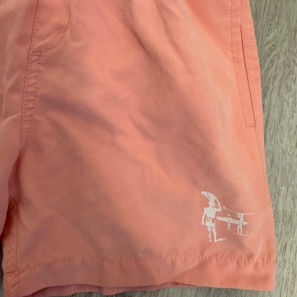 The Endless Summer Kids Swim Trunks in Orange pink color